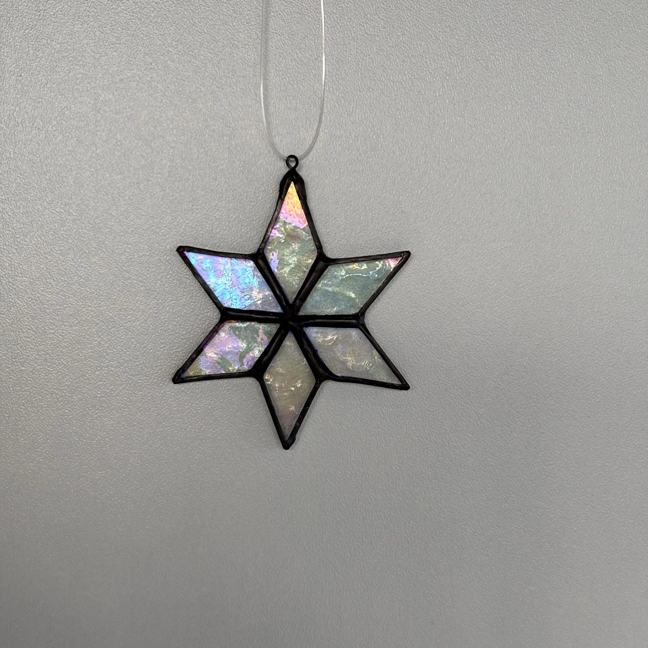 Tiffany glaskunst: Een ster van iriserend glas